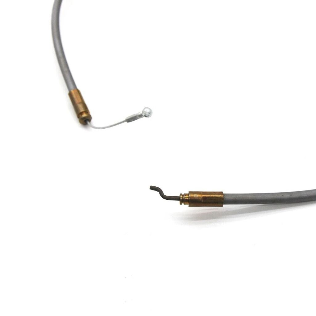 Close-up view of seat tilt control cable ends with brass connectors and metal hooks.