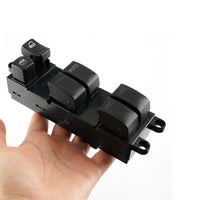 Power window control switch held in hand displaying multiple rocker switches and auto window button.